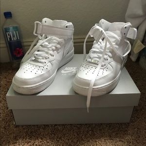 NIKE MID TOP AIR FORCE 1s